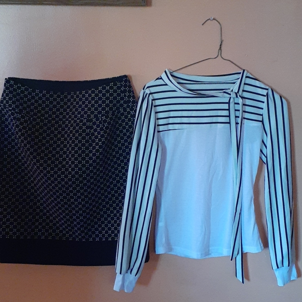 It is a shirt and skirt